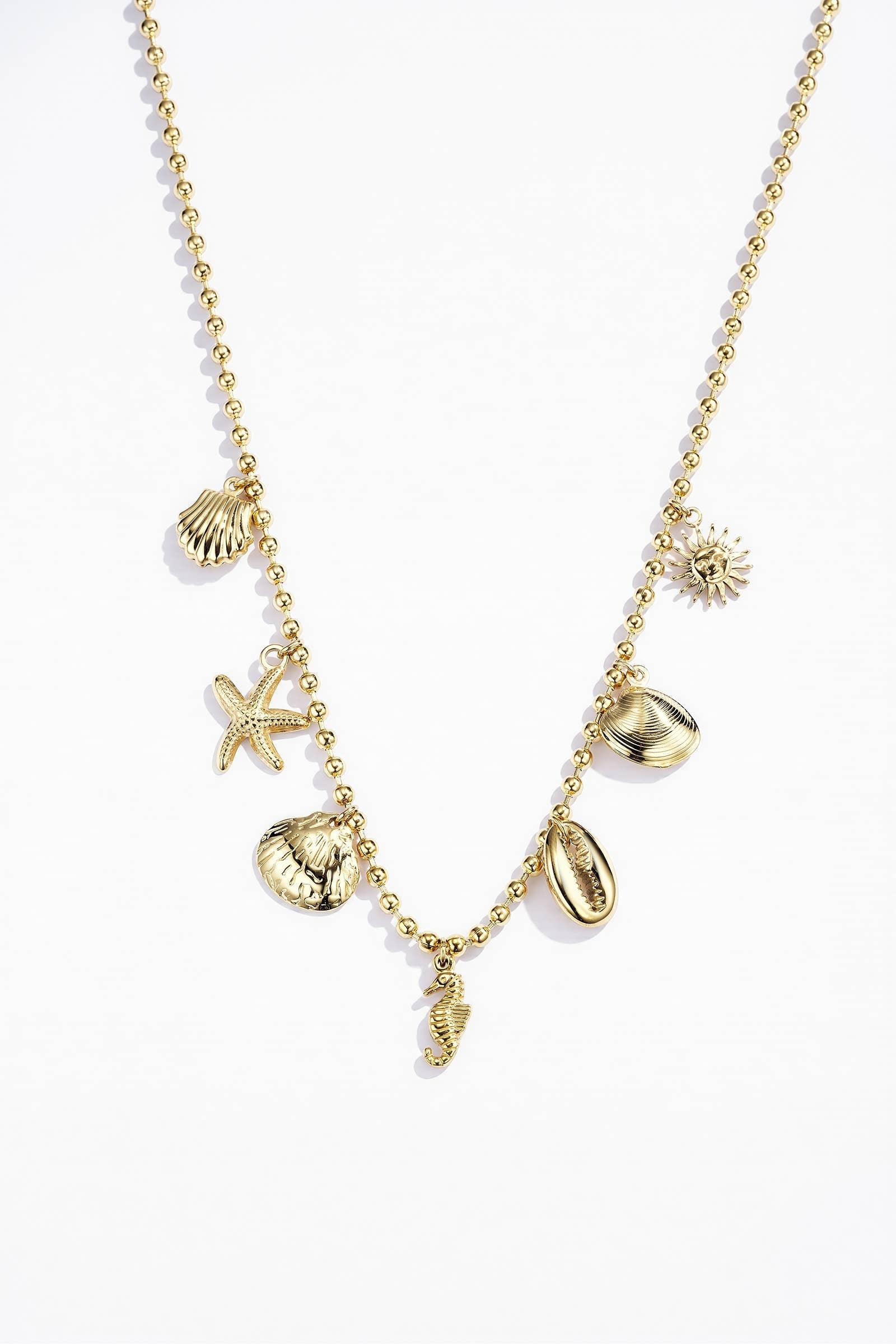 Bohomar Studio goldene Boho Kette mit maritimen Anhängern Muscheln Seestern