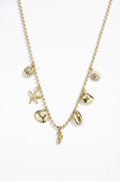 Bohomar Studio goldene Boho Kette mit maritimen Anhängern Muscheln Seestern